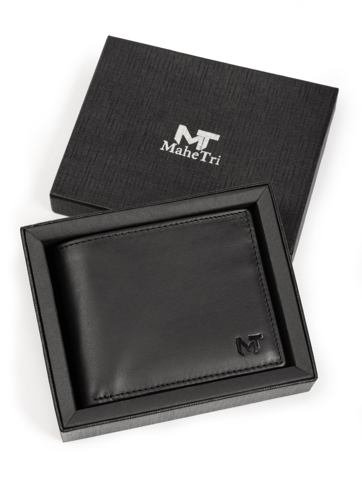 Black bi-fold wallet open in box, showing card slots and MT emblem