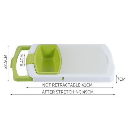 Green and white plastic chopping board with raised ridged drain insert