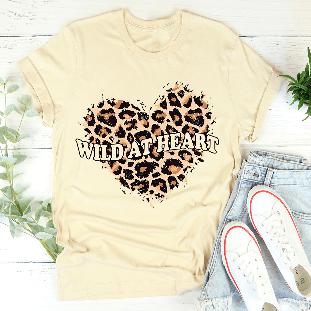 Cream crew-neck T-shirt with leopard heart graphic and "Wild At Heart" text