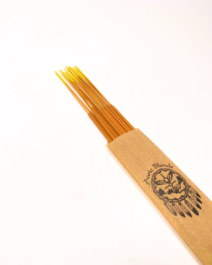 Single incense stick with tan paper band and printed emblem