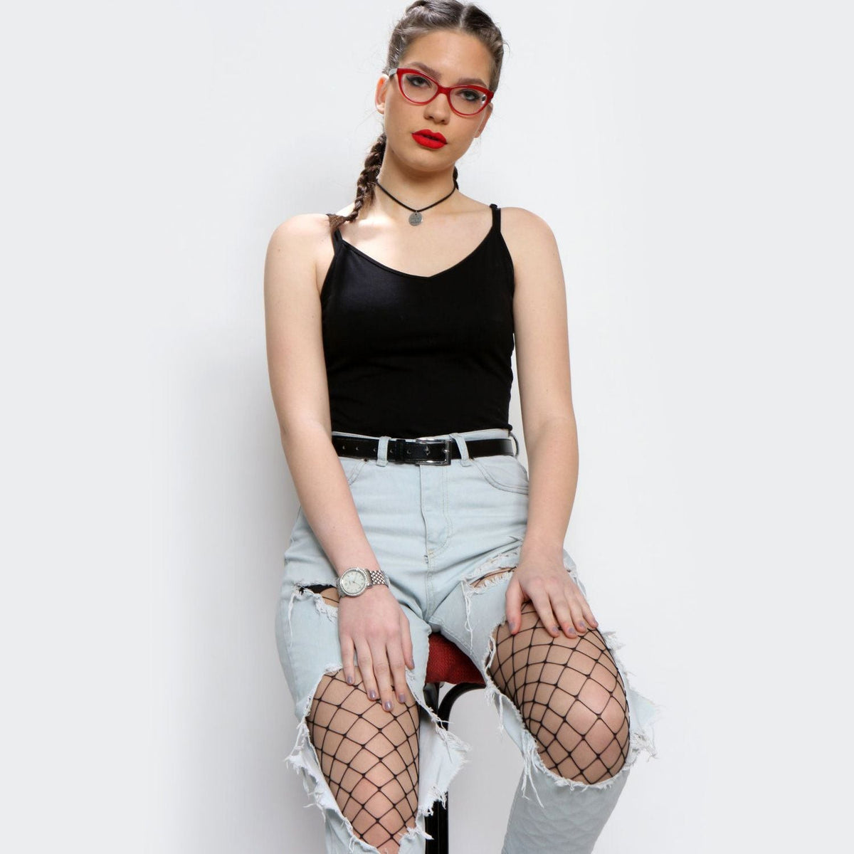 Fishnet tights with diamond mesh on legs and high-waist band, sheer look