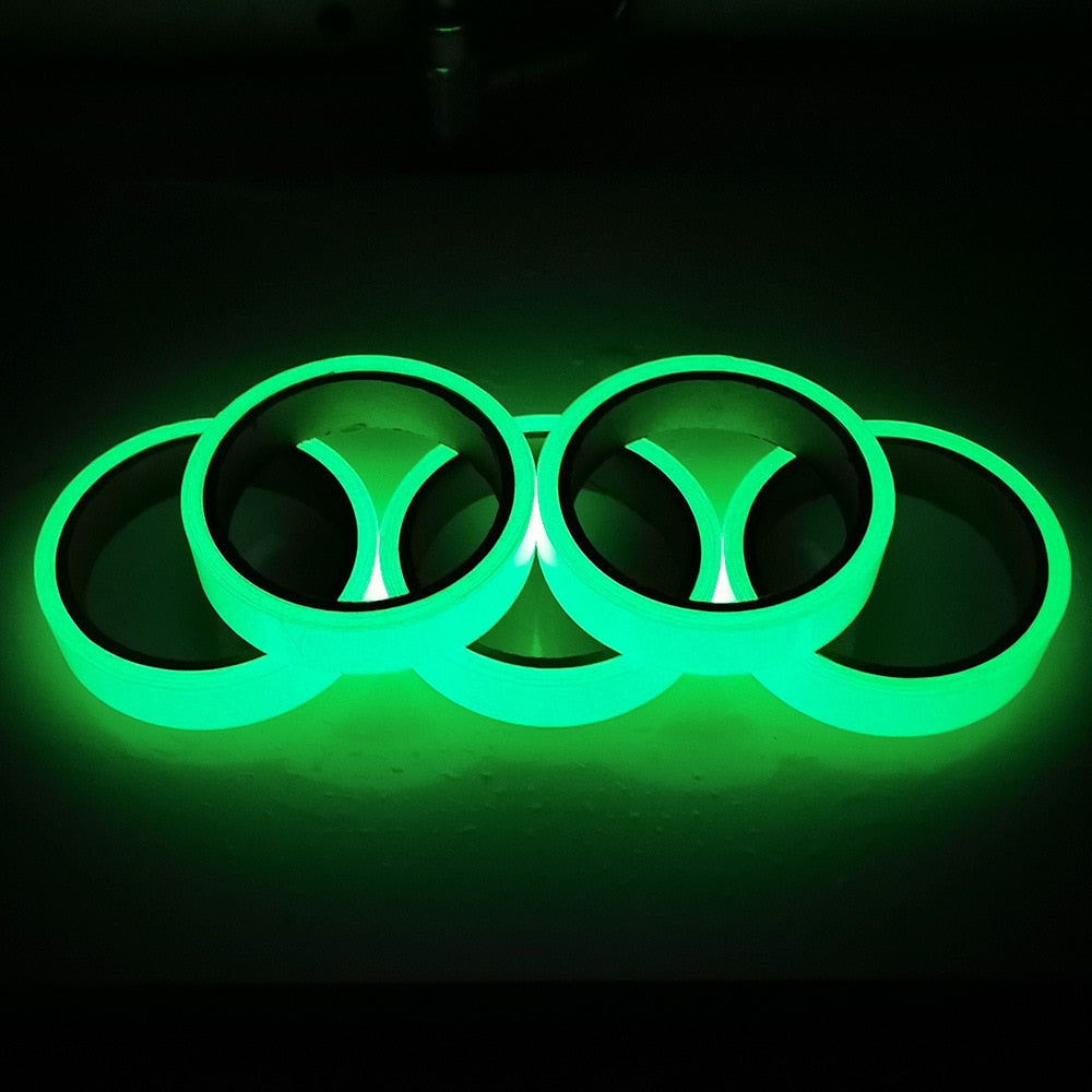 Glow-in-the-dark sticker tape in green shaped into a circular design with glow