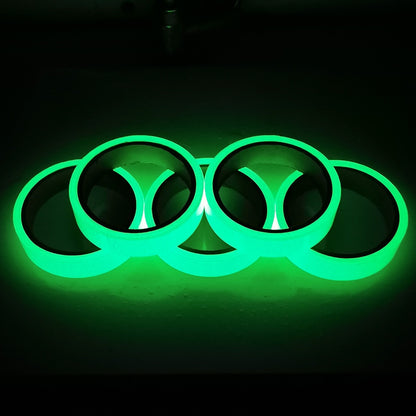 Glow-in-the-dark sticker tape in green shaped into a circular design with glow