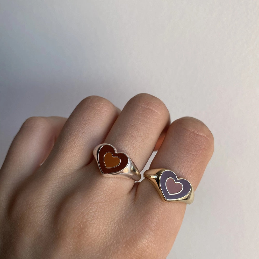 Heart enamel ring with dark red center and gold-tone frame