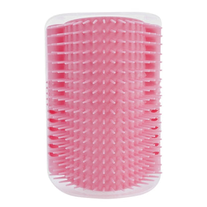 Cat self-groomer corner brush with pink bristles and white base