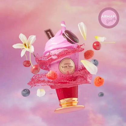 Yum Yum eau de parfum spray bottle, pink swirl cap with gold base and berries