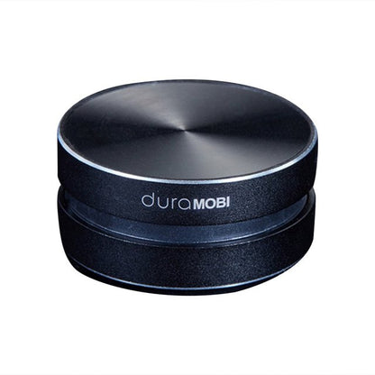 Black bone-conducting speaker with duraMOBI logo on textured top
