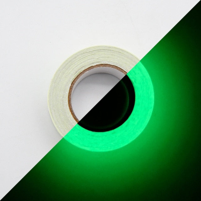 Glow-in-the-dark sticker tape roll with green glowing ring