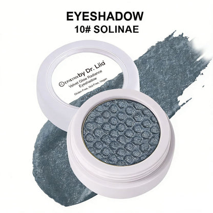 Eyeshadow compact with dark blue shimmer pan and matching swatch