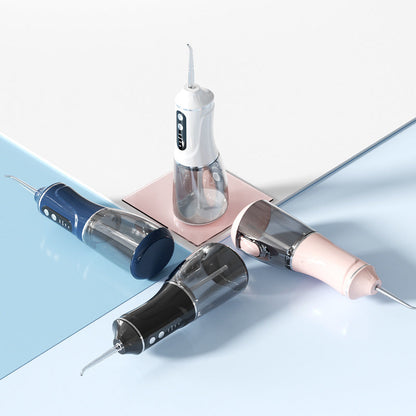 Portable electric dental flosser set with white and black handheld units