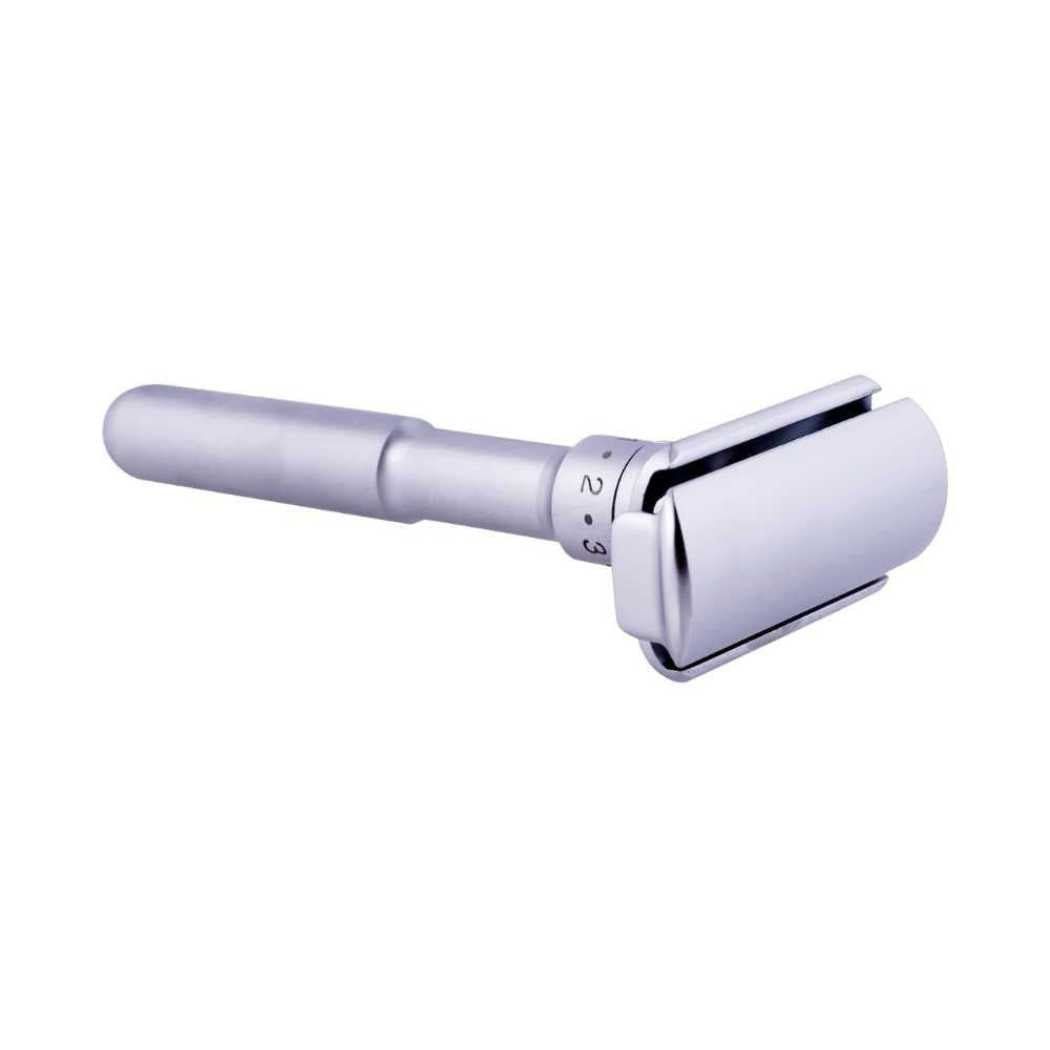 Adjustable double-sided safety razor close-up, silver head and numbered dial