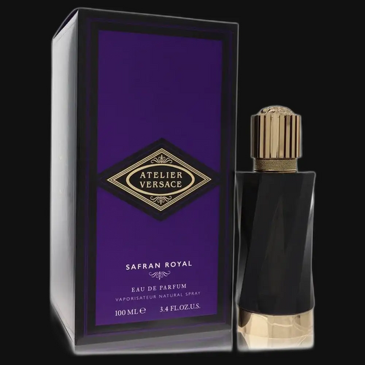 Unisex eau de parfum bottle with gold cap, shown with matching purple gift box