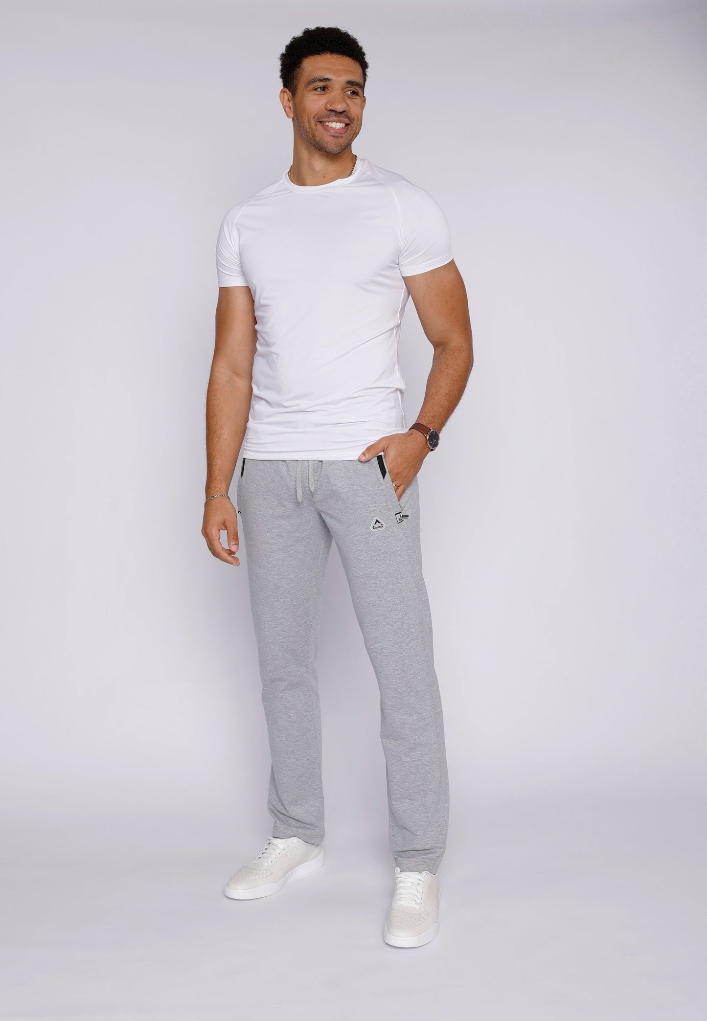 Light grey heather straight athletic sweatpants with drawstring waist, side emblem