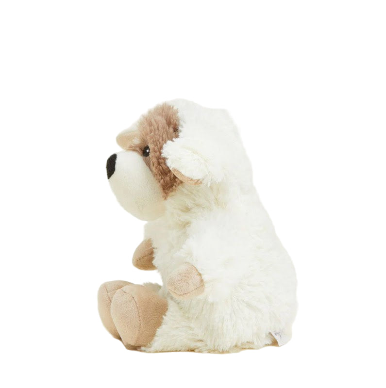 Sitting puppy plush toy with white fur and brown ear patches