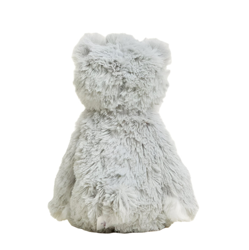 Gray plush cat with rounded ears and long body, standing upright
