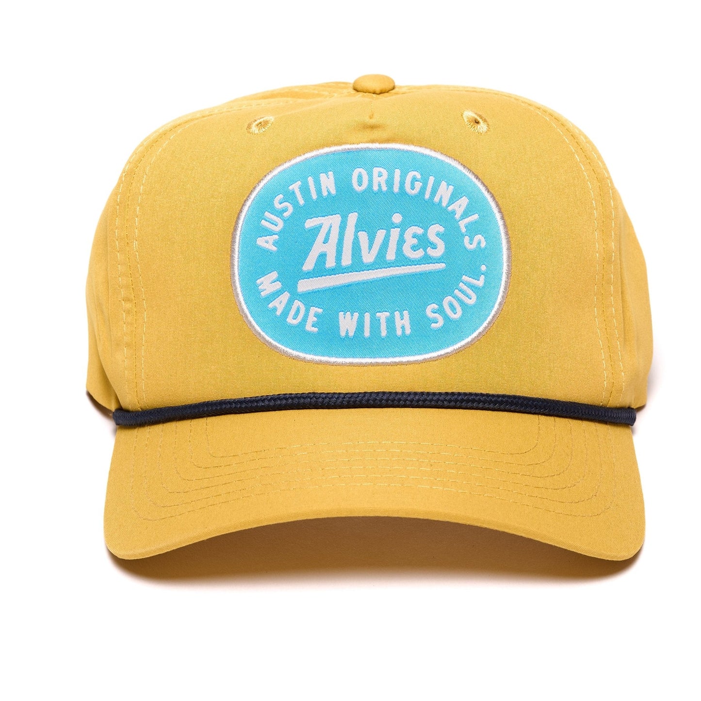 Yellow snapback hat with round blue logo patch on the front and dark underbill.