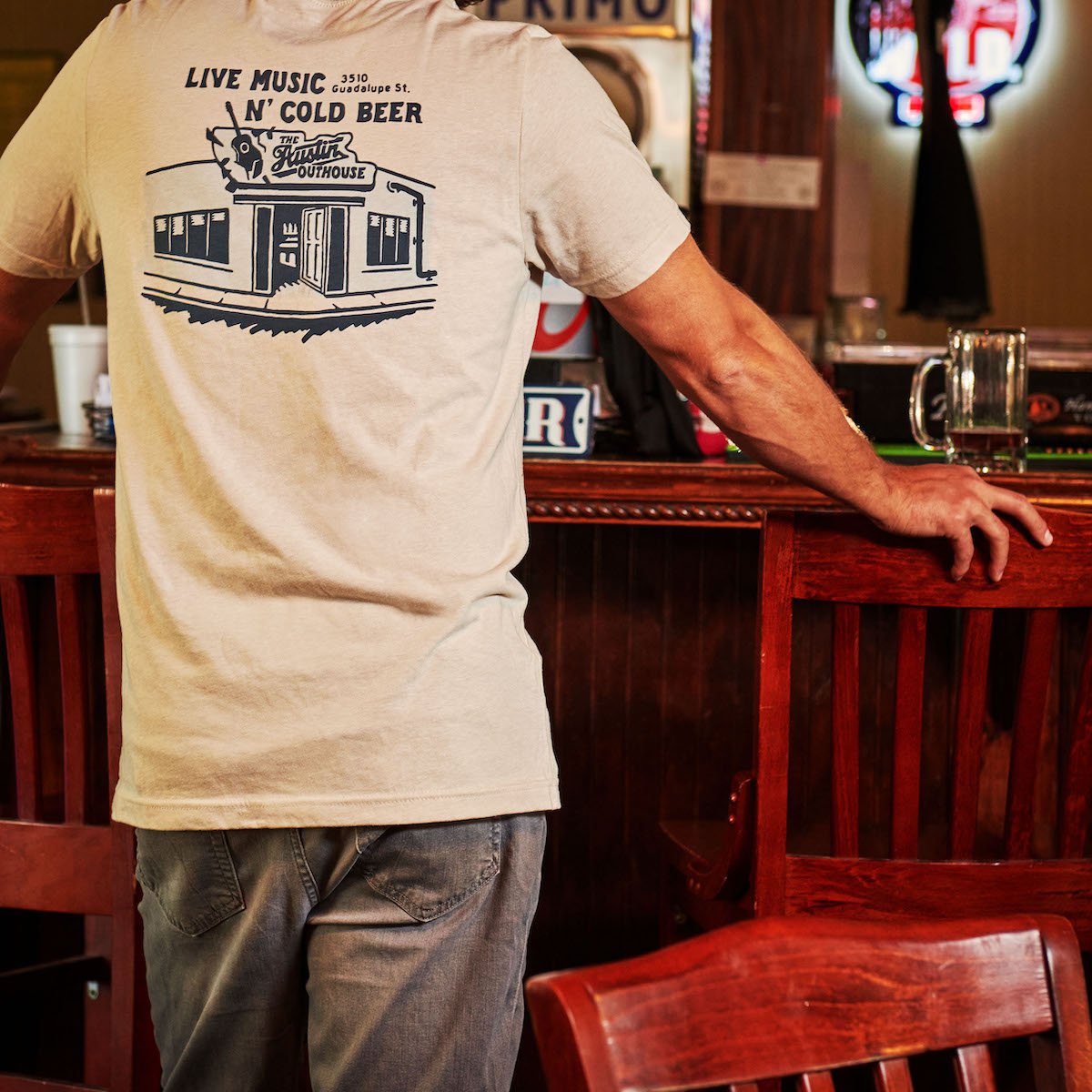 Light gray t-shirt with blue 'Live Music N' Cold Beer' front graphic, short sleeves.