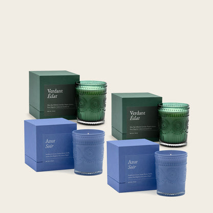 Scented candle set with green and blue gift boxes and glass candle jars