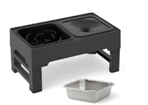 Elevated dog bowl stand with dark top and one stainless feeding bowl, adjustable legs