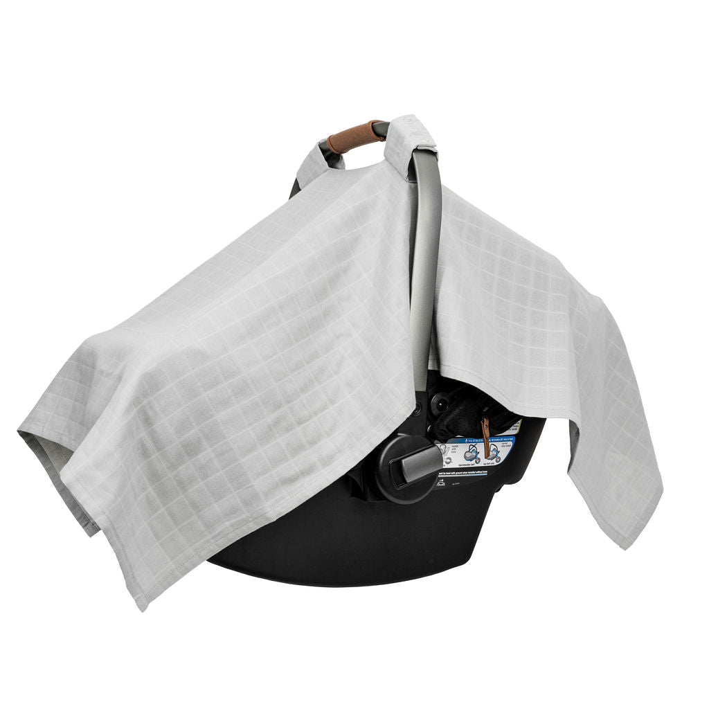 Muslin car seat cover in gray with draped canopy panels