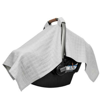 Muslin car seat cover in gray with draped canopy panels