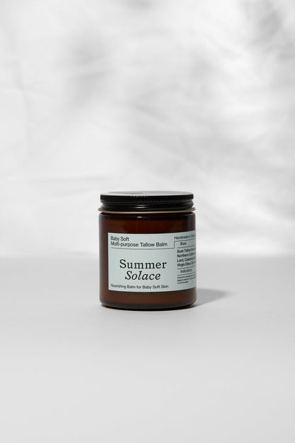 Family balm jar with dark cap and amber container, top and front view