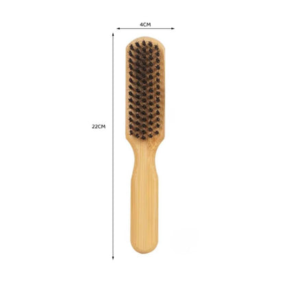 Bamboo beard brush with dense dark bristles and long light wood handle