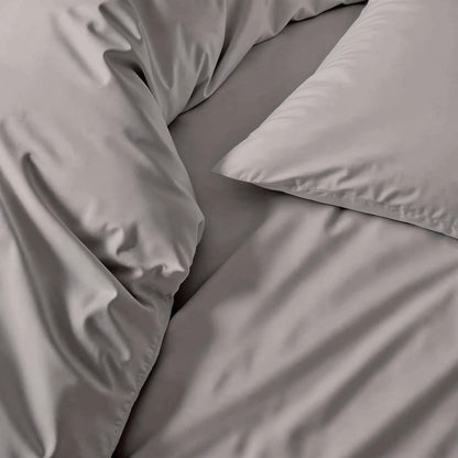 Luxe sateen pillowcase set, gray close-up of smooth fabric and pillow seam