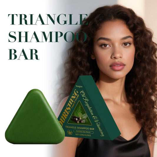 Green triangle shampoo bar with herbal label, triangular shape for hair washing