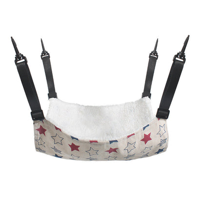 Pet hammock with star-print fabric lining and white plush seat, black straps