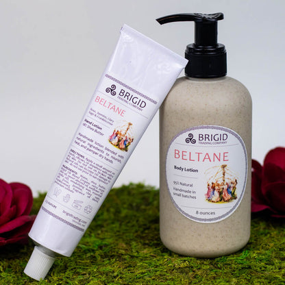 Hand lotion tube with white cap, BRIGID BELTANE label next to pump bottle