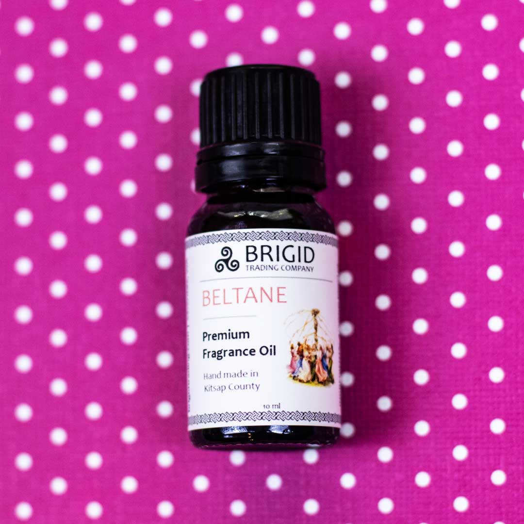 Diffuser oil bottle with black cap, BRIGID BELTANE label, centered