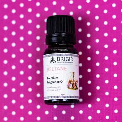 Diffuser oil bottle with black cap, BRIGID BELTANE label, centered