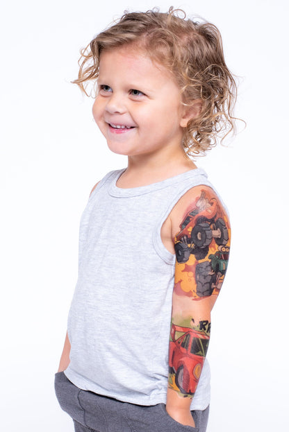 Kids temporary tattoo sleeve with orange and black monster-truck design on forearm