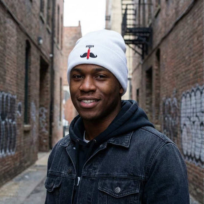 Light gray knit beanie with black anchor emblem and red accent on front.