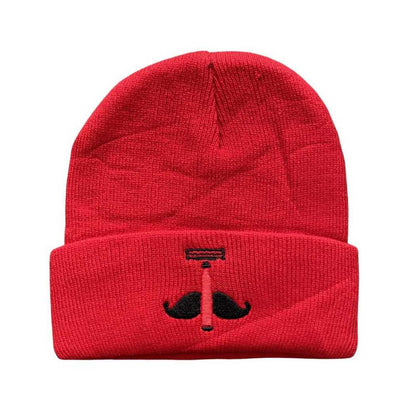 Red ribbed knit beanie with black anchor emblem and small red center on front.