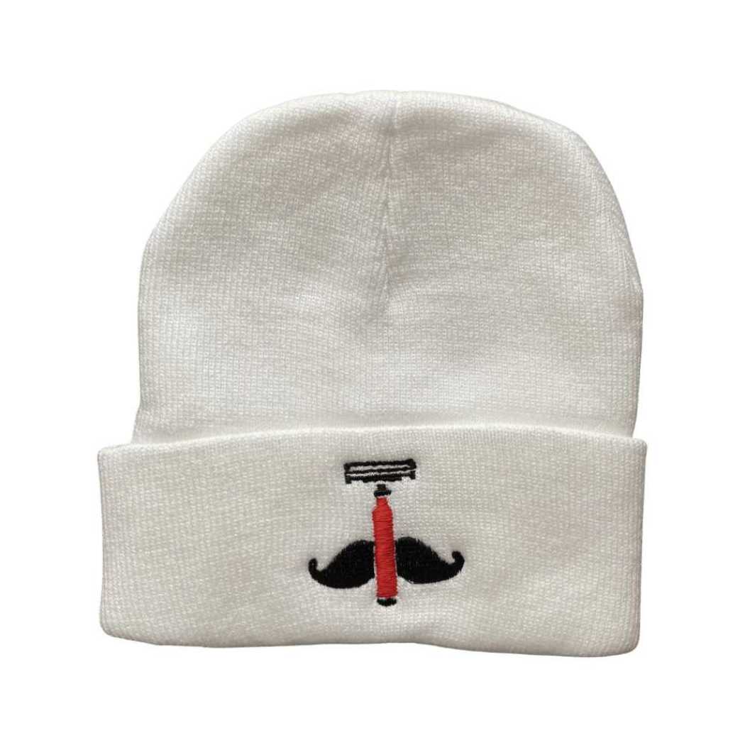 Light cream knit beanie with black anchor emblem featuring a red center on front.
