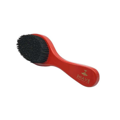 Red boar bristle hair brush with rounded head and curved handle