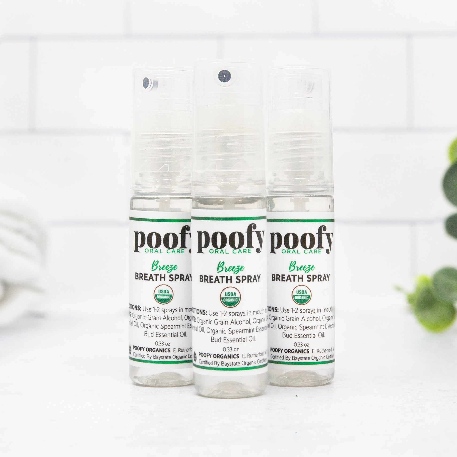 3-pack breath spray bottles with clear pump tops, green-and-white Poofofy labels