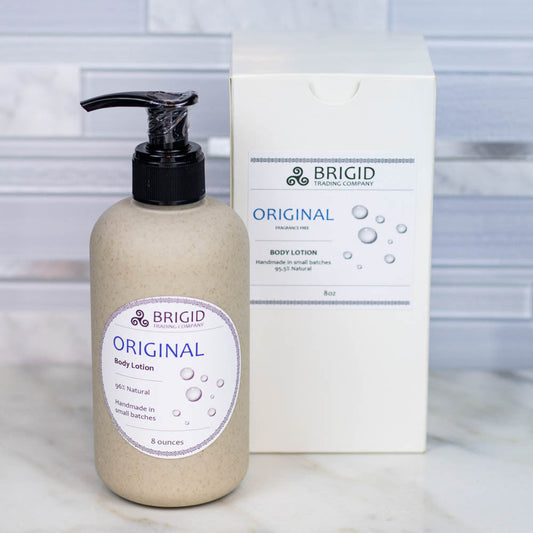 BRIGID Original body lotion pump bottle with black dispenser and beige lotion