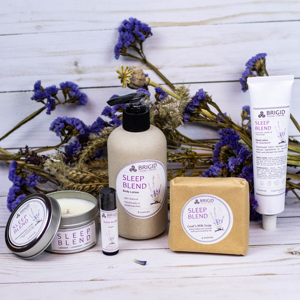 Sleep Blend set with lip balm tube, body lotion bottle, and tin