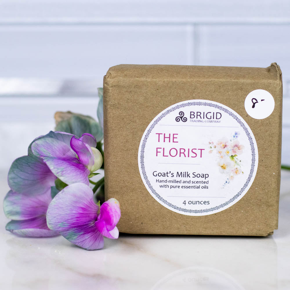 Goat's milk soap bar in kraft paper with 'The Florist' label, 4 ounces.