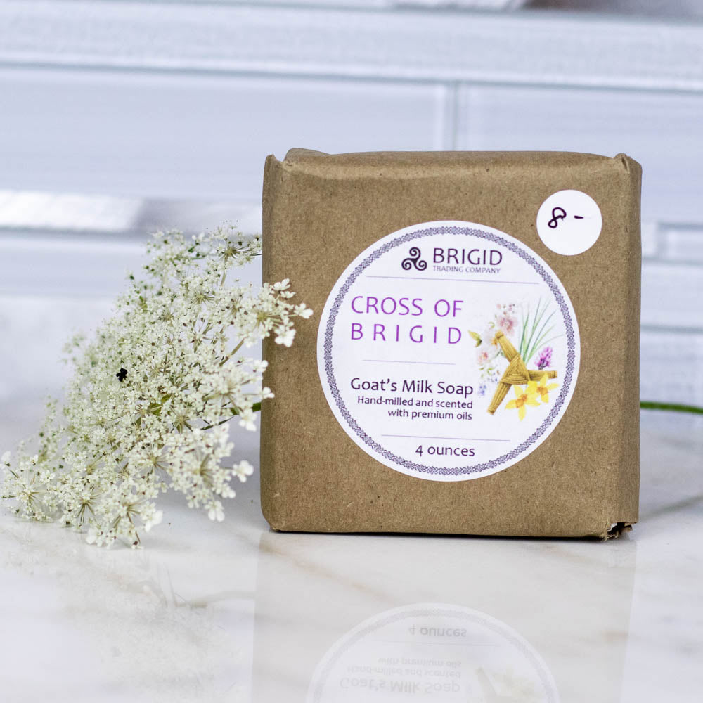 Goat's milk soap bar in kraft paper with 'Cross of Brigid' label, 4 ounces.