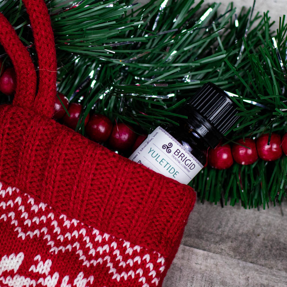 BRIGID essential oil blend bottle labeled YULETIDE