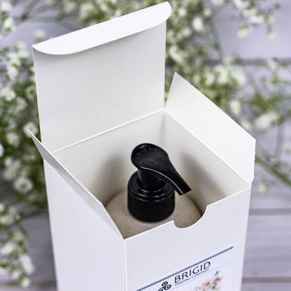 BRIGID Original body lotion pump bottle inside an open white box