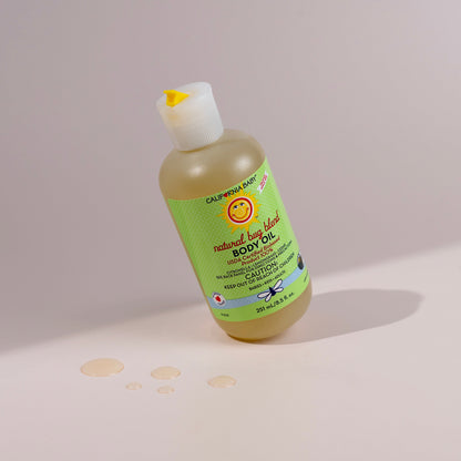 Bug Blend body oil bottle with flip-top cap, green label, pale yellow liquid