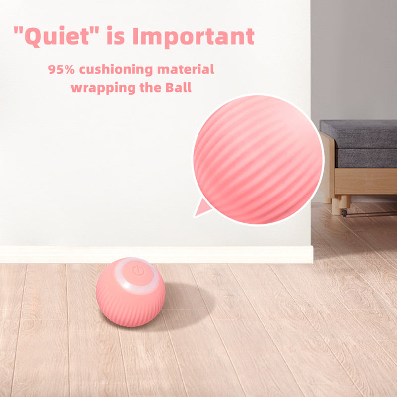 Pink cushioned automatic cat ball toy on floor with smooth power button top