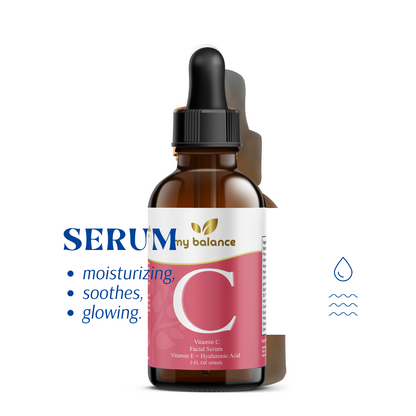 Facial vitamin C serum bottle with black dropper and pink C label on amber glass