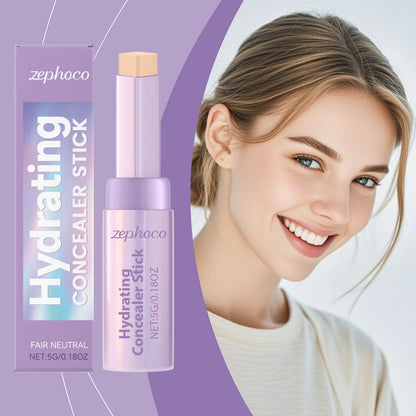 Hydrating concealer stick, ivory white shade, beside a smiling woman portrait