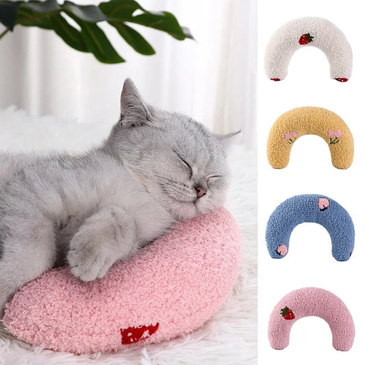 Pink plush U-shaped pet neck pillow with strawberry patch for cats